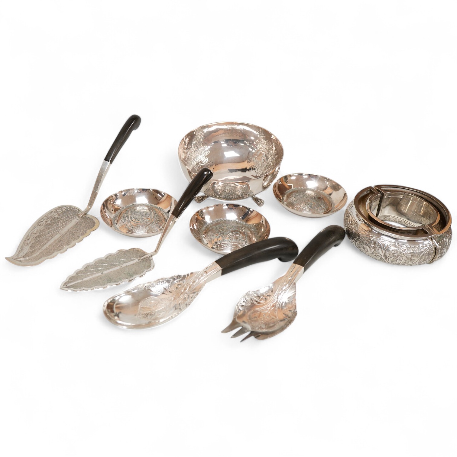 A small collection of mainly Malaysian white metal items including four hardwood handled servers, an 800 standard bowl, flower spreader and three small dishes.